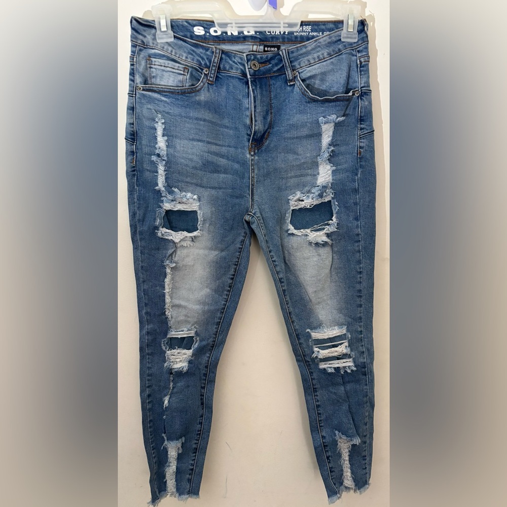 Distressed stretch jeans